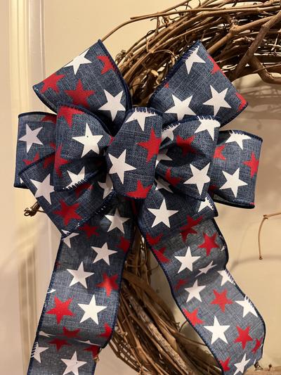 Red and white stars on blue ground decorative Patriotic bow