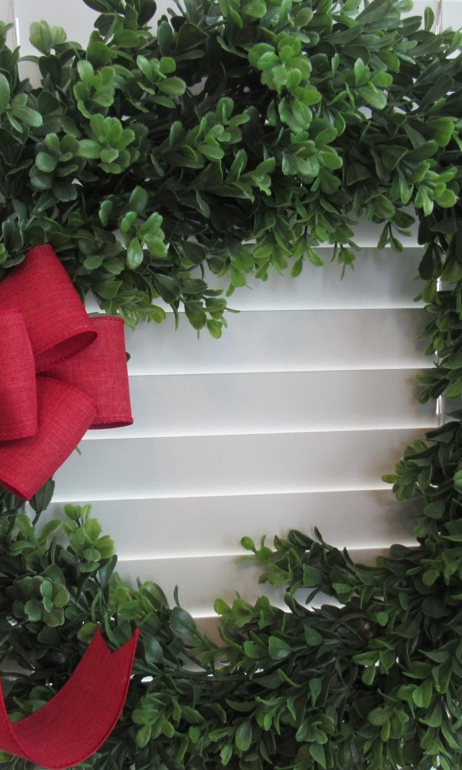 Red canvas linen look decorative wreath bow.