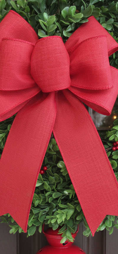 Red canvas linen look decorative wreath bow.