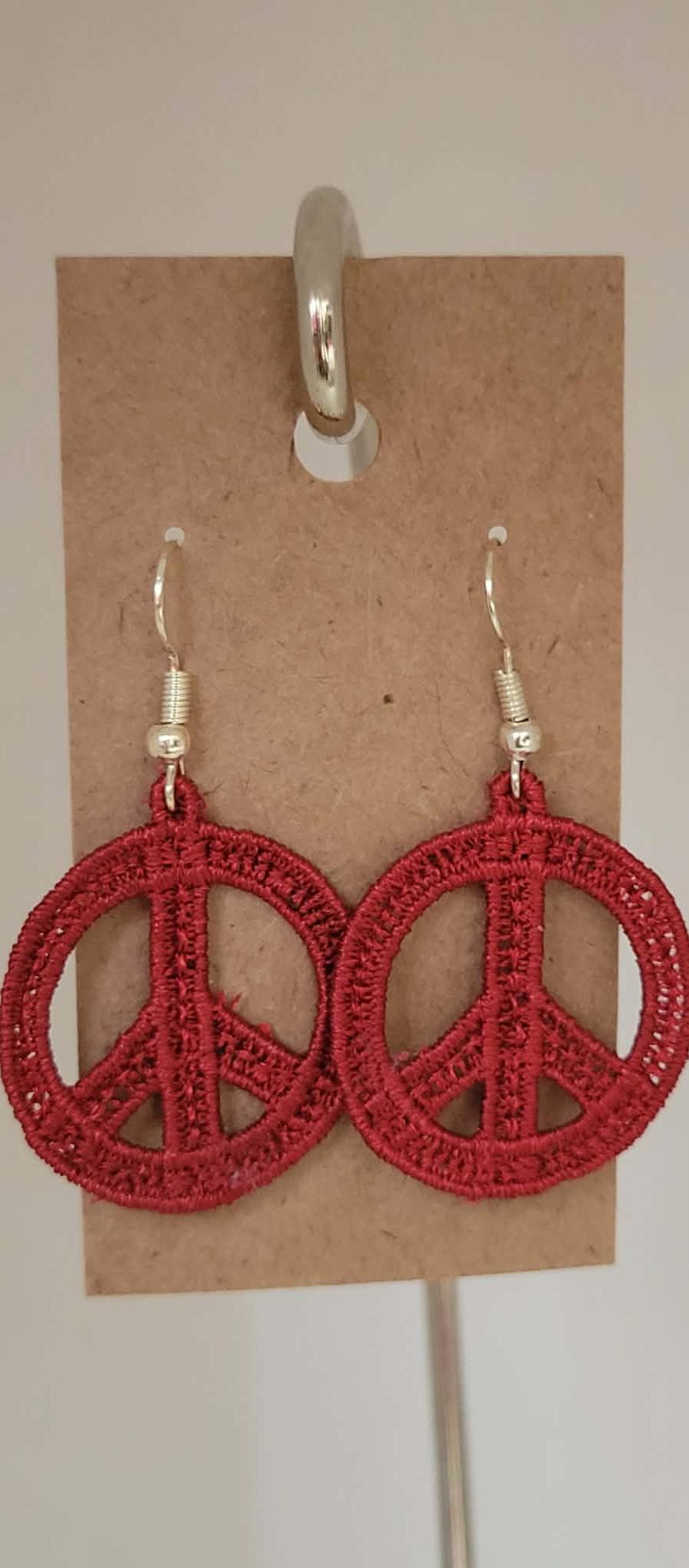 Peace symbol embroidered earrings