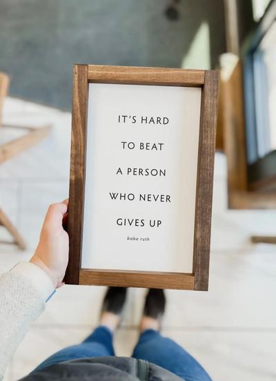 Hard to Beat A Person Who Never Gives Up Wood Sign
